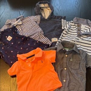 Assortment of collared shirts and one piece rompers